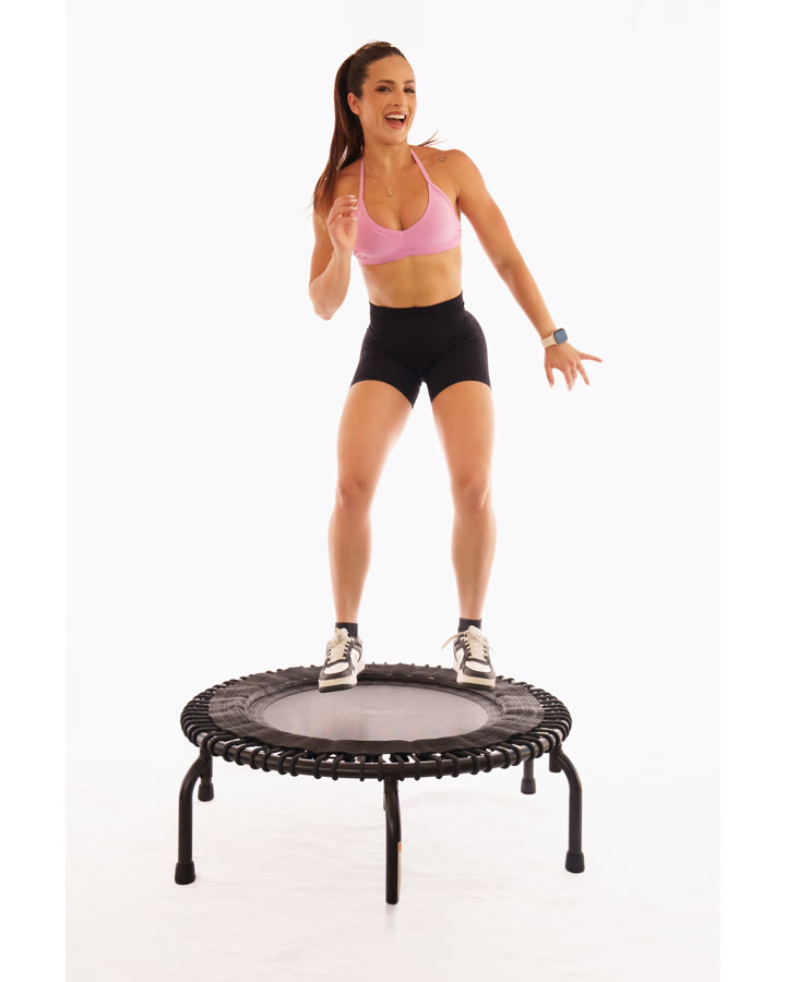 Cat mid jump on a rebounder